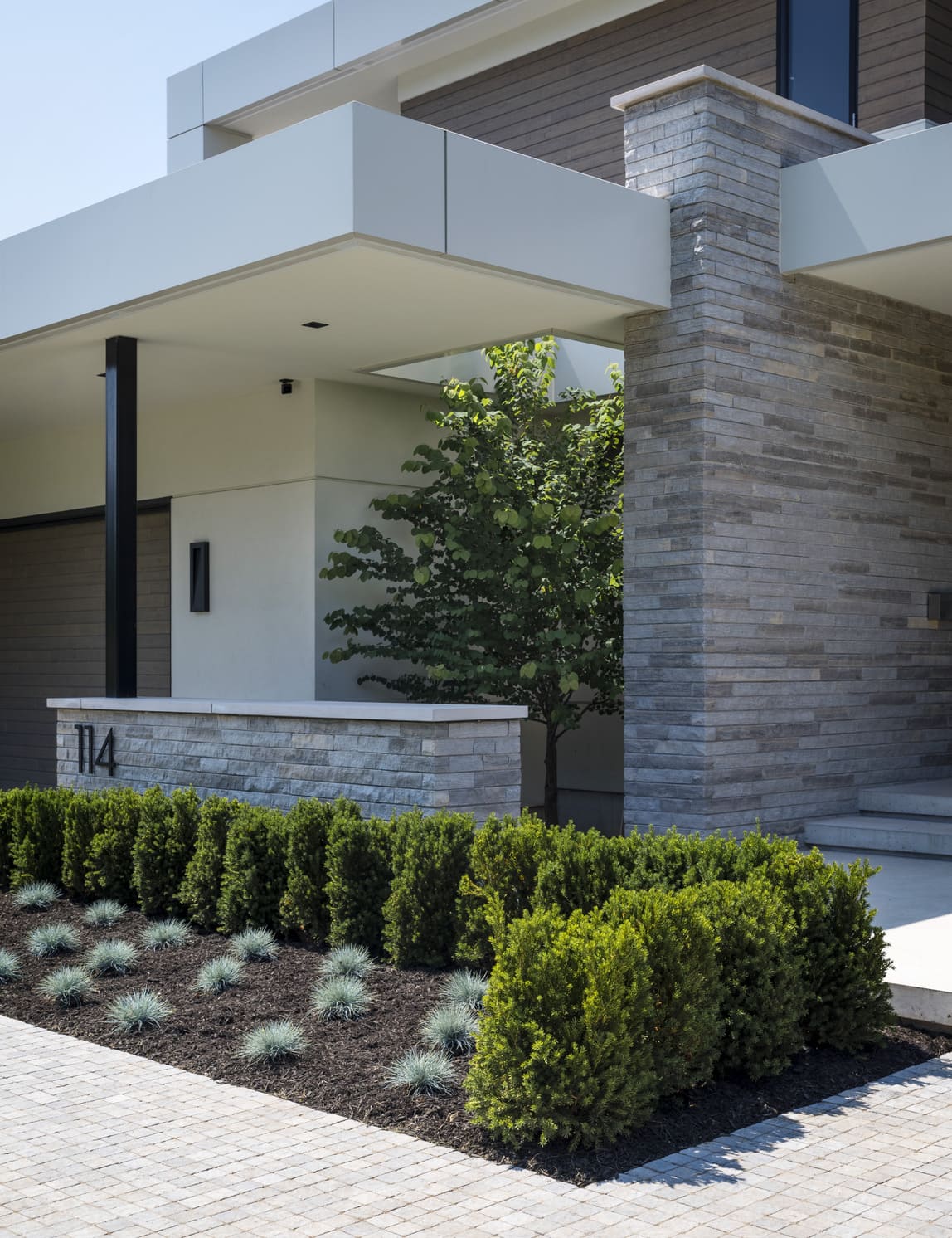 Gorgeous exterior details, masonry, and landscaping to perfect in Waterdown.